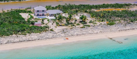 On the beach, sun-loungers, beach towels