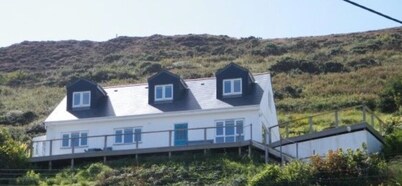 Contemporary Beach House with sea views and short walk to Blue Flag beach