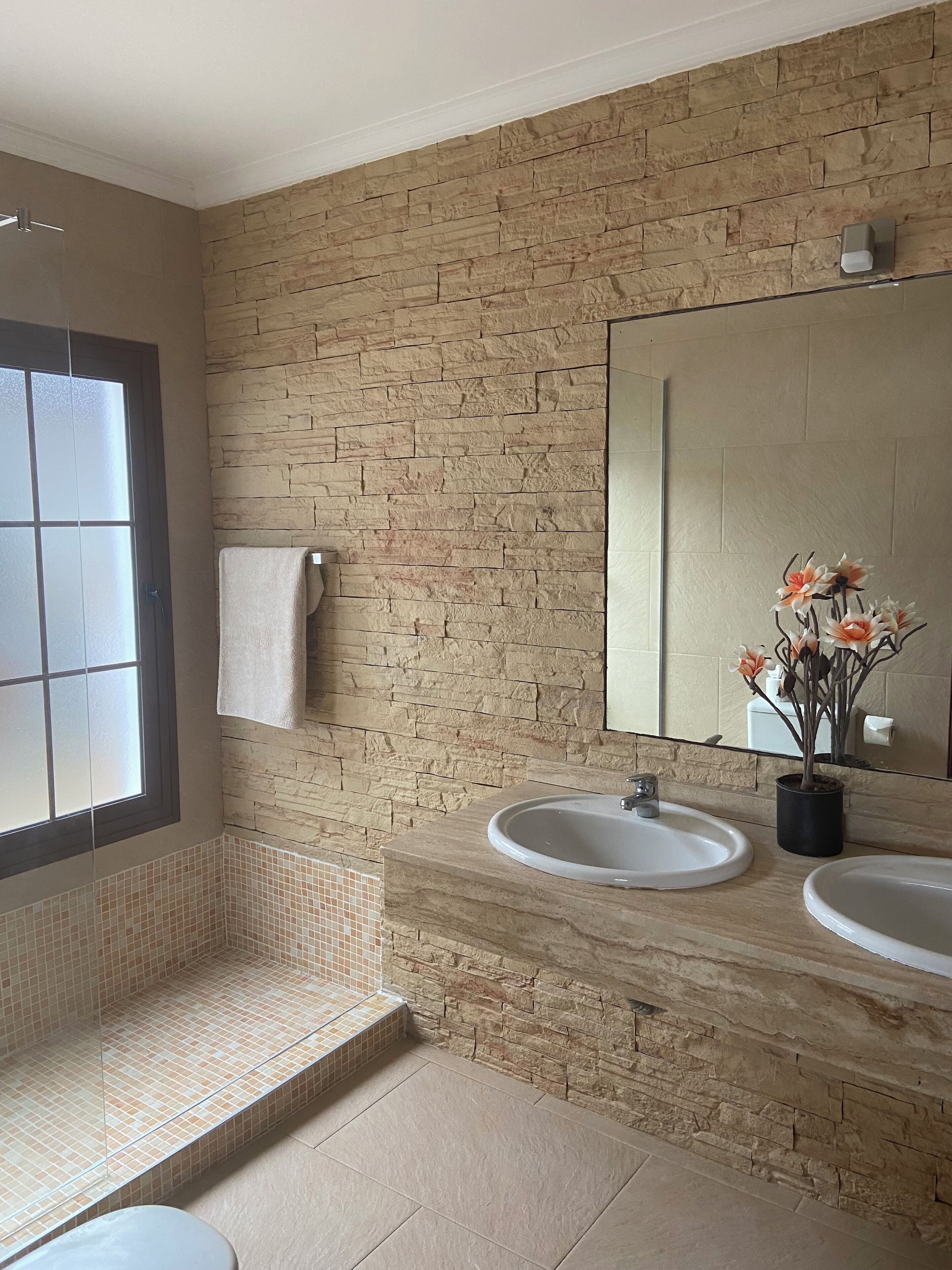 Bathtub, hair dryer, towels, soap