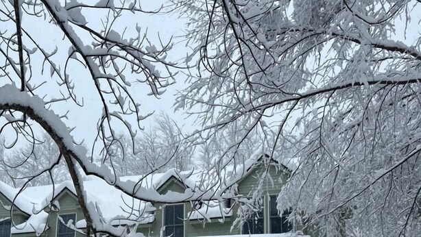 A snow-covered house with a small porch and a green door. - Dates opened for Fall! new discounted rates for September. (Stowe)