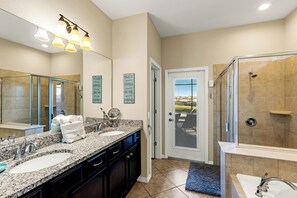 Bathtub, hair dryer, towels, soap