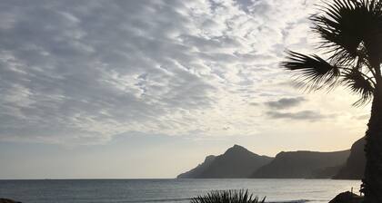 Villa with stunning views,easy access to swimming pool/ beautiful gardens. A/Con