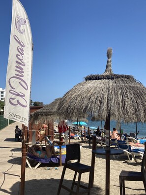 Beach nearby, sun loungers
