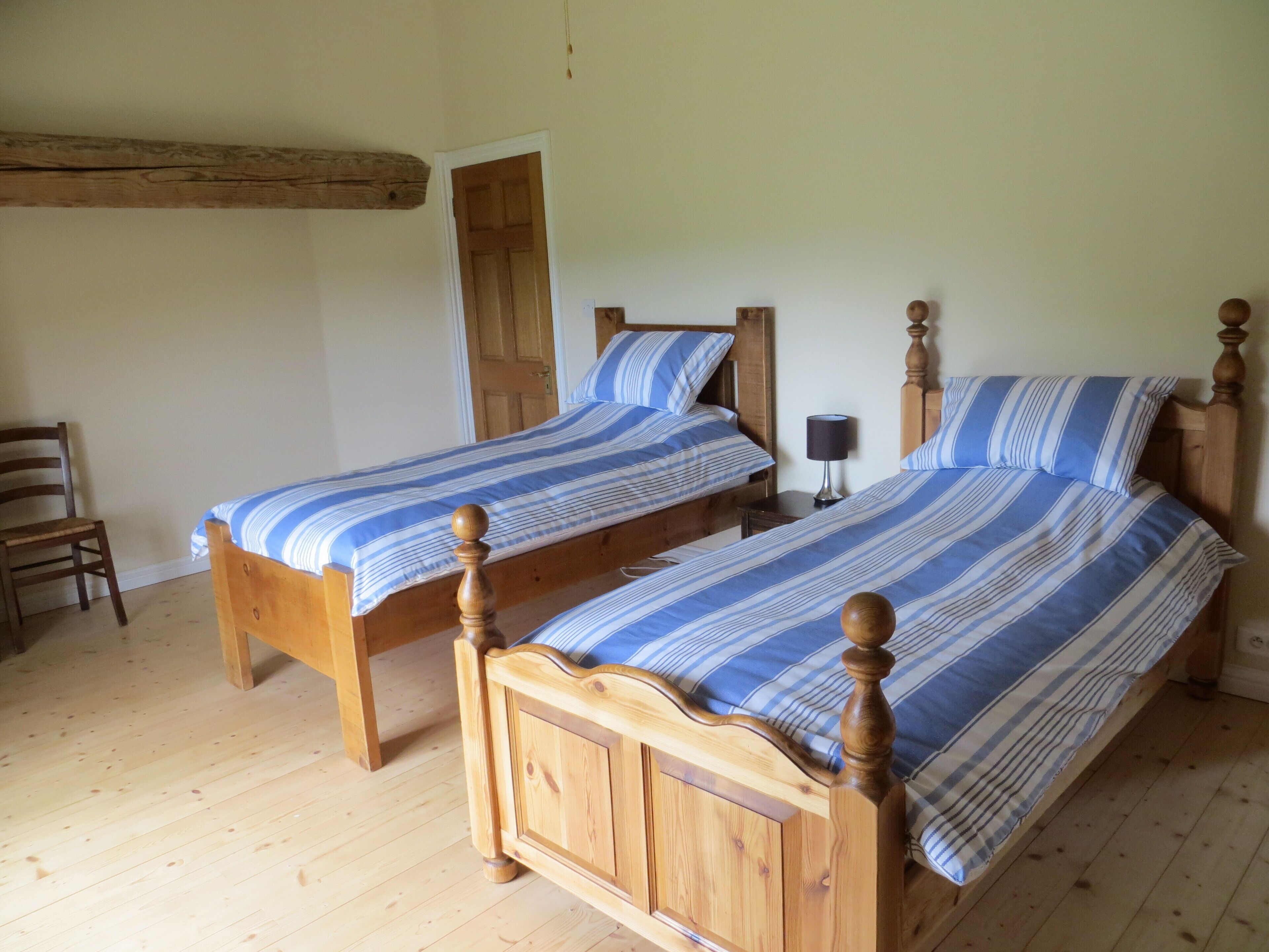 Sunny twin bedded room