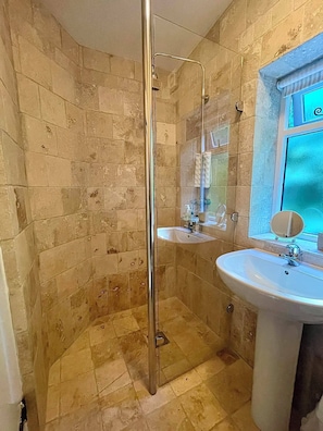 Shower, eco-friendly toiletries, hair dryer, towels