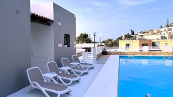 Outdoor pool, sun loungers