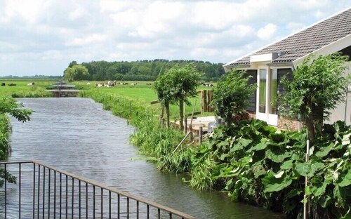 Beautiful, country style cottage near the windmill, polder and windmill view