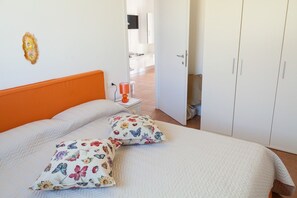 2 dormitorios, tabla de planchar con plancha, wifi gratis y ropa de cama