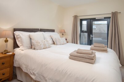 Bank Conversion with Roof Top Garden close to centre of Ancient Coaching Village