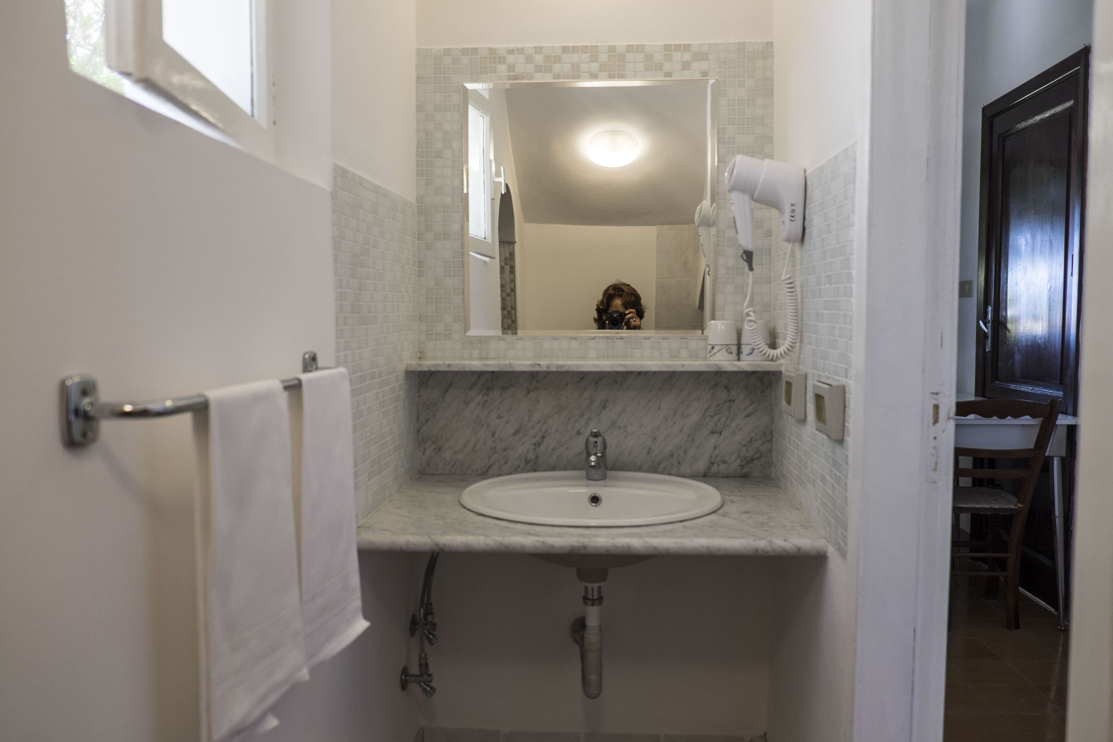 shower, hair dryer, bidet, toilet paper