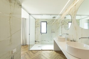 Bathtub, hair dryer, towels