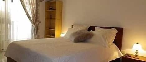 2 habitaciones, tabla de planchar con plancha y wifi gratis
