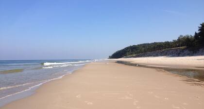Reetdach Ferienhaus am Woliner Nationalpark mit Blick auf den Neuendorfer See