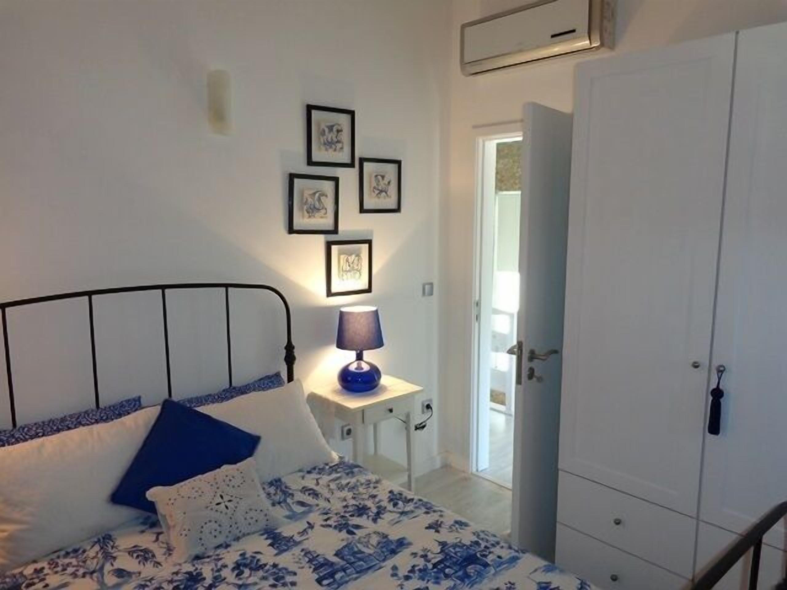 Old stone house with swimming pool and river.