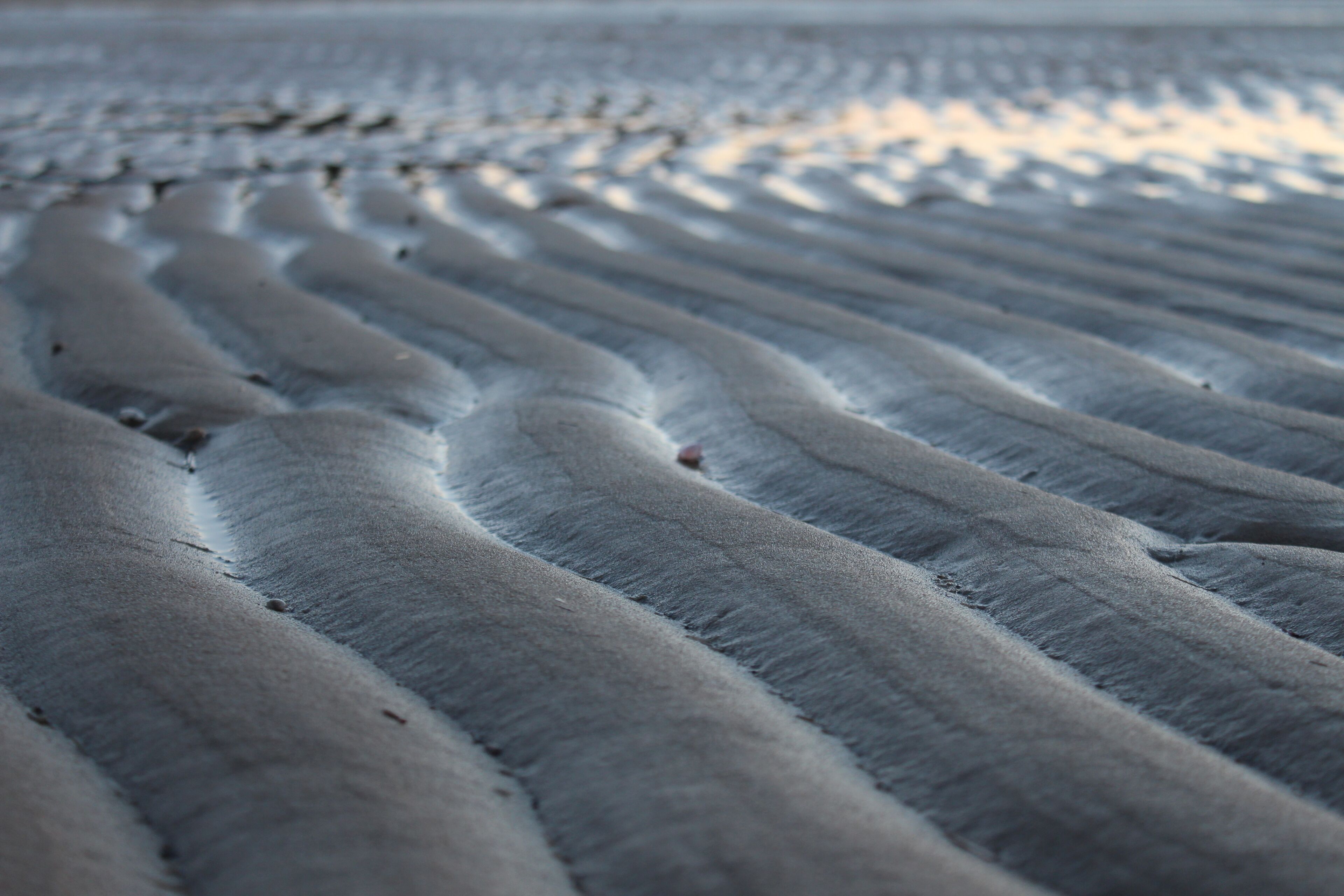 A close-up of a textured surface with wavy patterns.