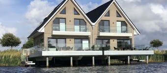 Pfahlhaus Perle am Yachthafen Carolinensiel Harlesiel ❤️, Living on the water