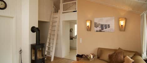 Una televisión, una chimenea, un reproductor de DVD