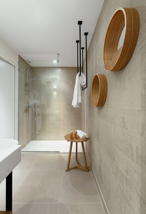 Shower, hair dryer, towels, soap