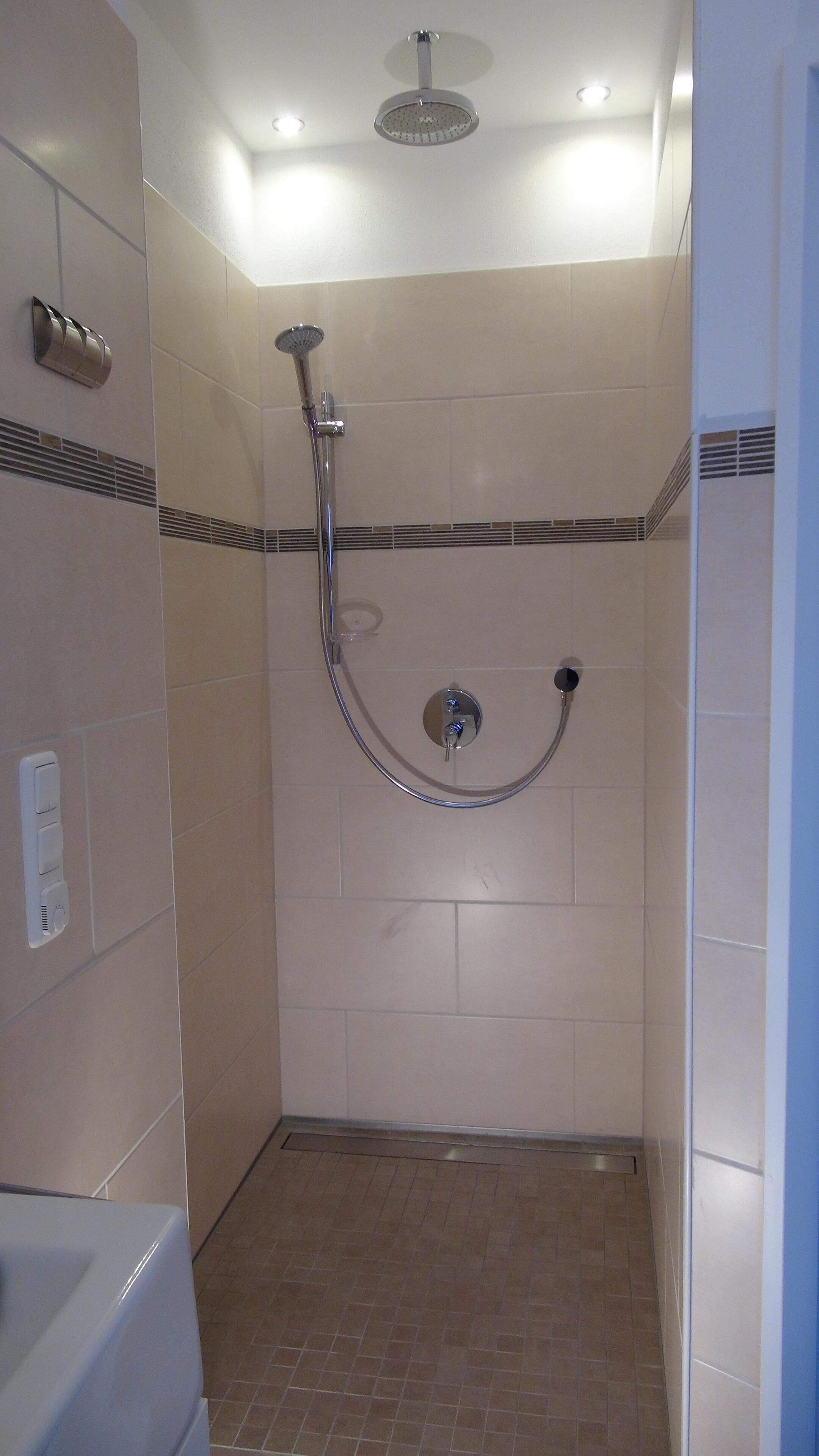 Bathtub, hair dryer, towels, soap