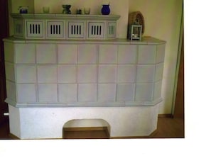 A storage unit with multiple compartments and a small opening at the bottom. - Family-friendly vacation home in quiet location w/large garden (Hilders)