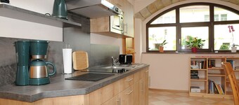 Apartment "Bauernstube" with pool and sauna use on a restored 3 side courtyard