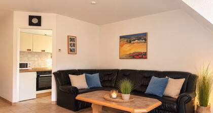 Sturmmöwe Vacation Rental · South-facing balcony with a view of the dike · Just 100 m from the beach