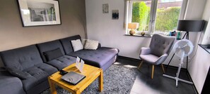 Smart TV, DVD player, foosball, books