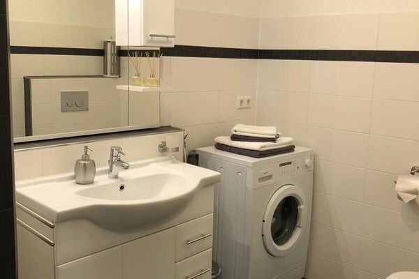 Ducha, toallas y papel higiénico