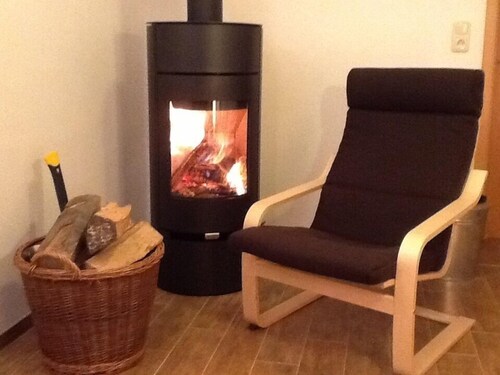 Quaint half-timbered house in the Harz Mountains. Renovated vacation apartment with fireplace & wooden terrace