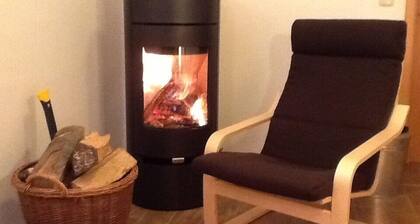 Quaint half-timbered house in the Harz Mountains. Renovated vacation apartment with fireplace & wooden terrace