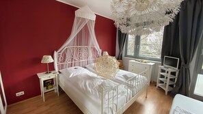 1 bedroom, desk, iron/ironing board, travel crib