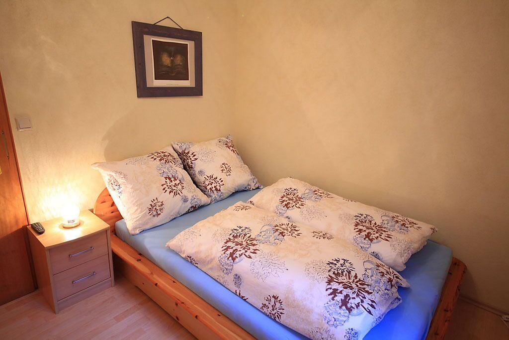 Apartment in an idyllic forest location with private balcony and terrace