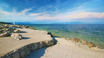Beach nearby, sun loungers