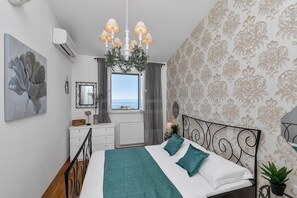 3 quartos, ferros/tábuas de passar roupa, Wi-Fi, roupa de cama