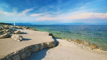 Beach nearby, sun loungers