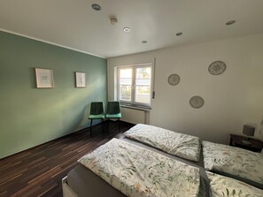 2 bedrooms, desk, iron/ironing board, travel crib