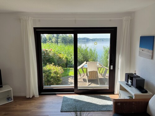 Idyllic holiday home in Timmdorf on a lake plot with its own lake access