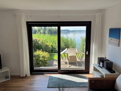 Idyllic holiday home in Timmdorf on a lake plot with its own lake access