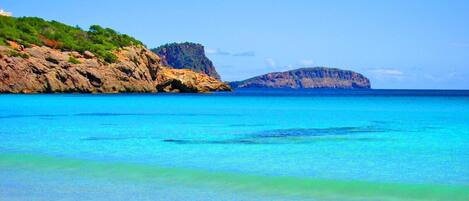 On the beach, sun loungers