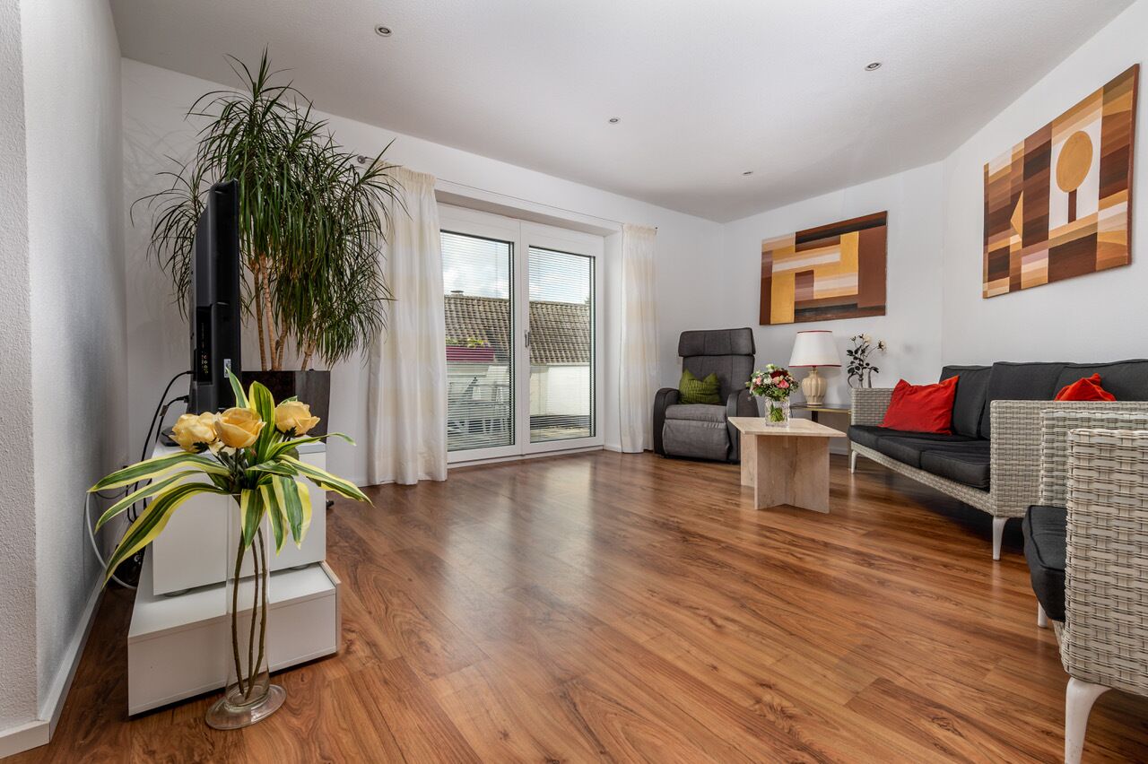 Light-flooded duplex with balcony in the suburb of the wine capital Würzburg