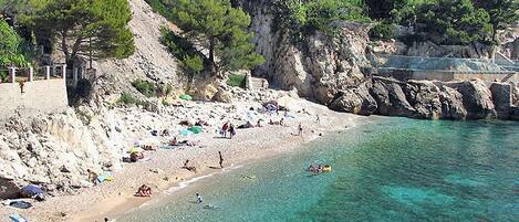 On the beach, sun loungers
