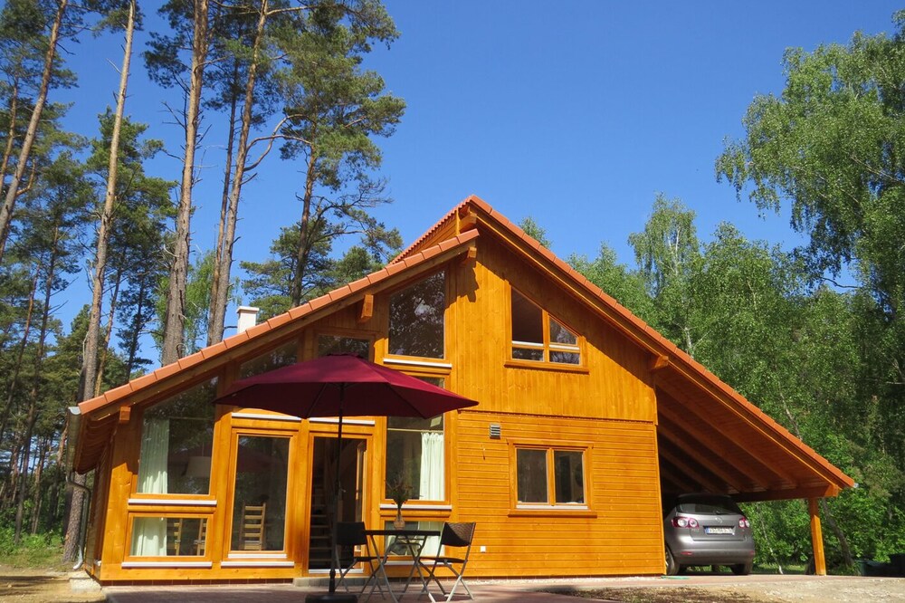 Your house on the lake with a fireplace, sauna and bathing area nearby!