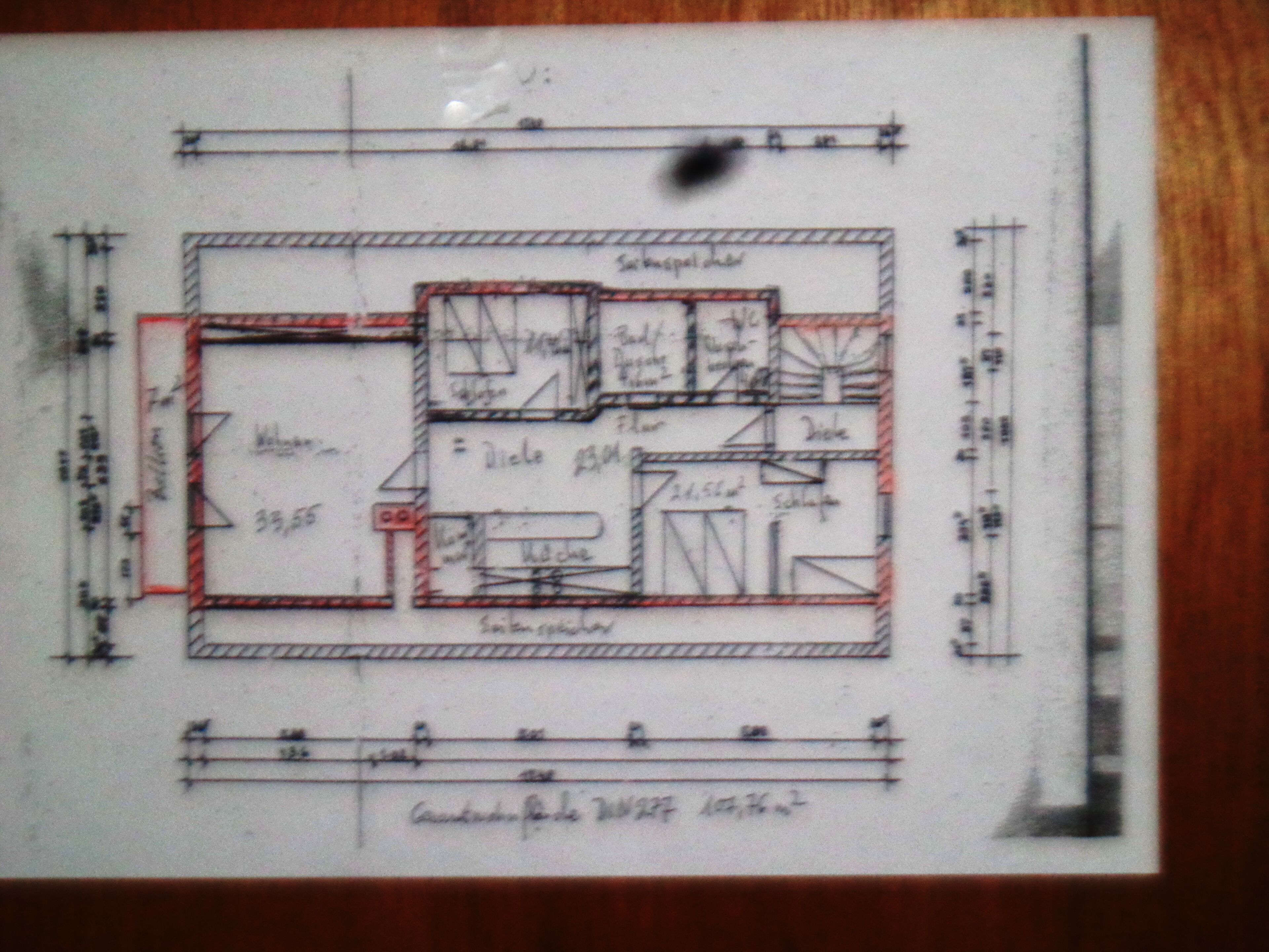 A technical floor plan with labeled rooms and dimensions.