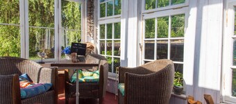 Circus wagon by the river