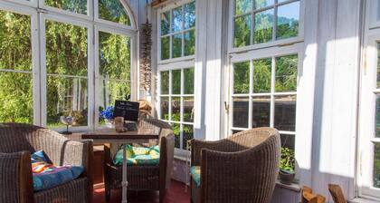 Circus wagon by the river