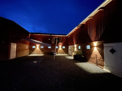Restored farmhouse on the dyke World Heritage Site Wadden Sea of Schleswig-Holstein