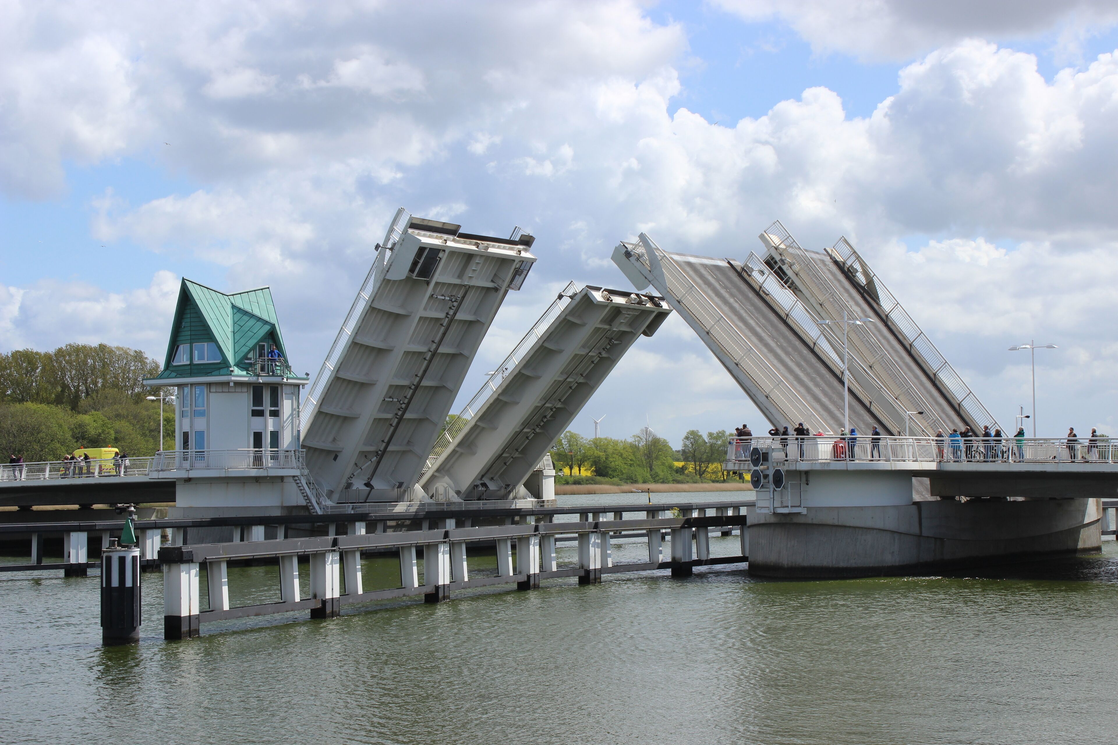 A bridge with a unique triangular structure and a control tower.