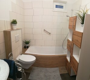 Hair dryer, towels, soap, toilet paper