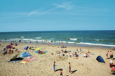 Rest, walk and enjoy the wide beach and in April Tulips!!!