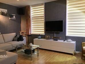 Smart-tv, een dvd-speler, een muziekbibliotheek en een filmbibliotheek